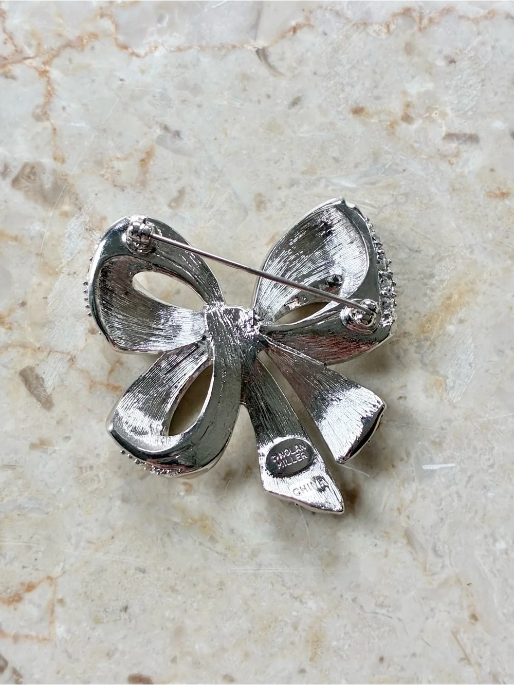 Nolan Miller Shining Spirit Bow Brooch Pin Vintage Silver Tone Rhinestones
